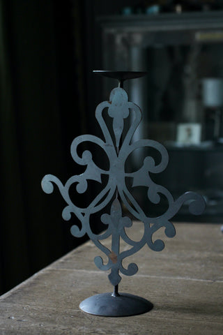 Recycled iron candle holder