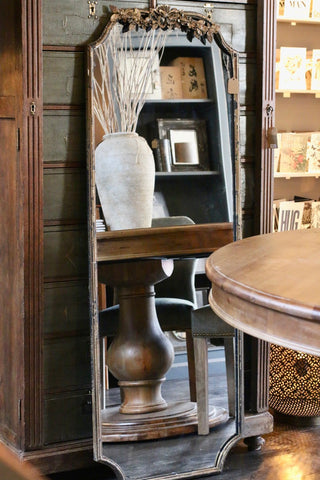 Decorative metal topped mirror