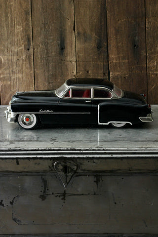 Black Type 1950s Cadillac Sedan Toy Car