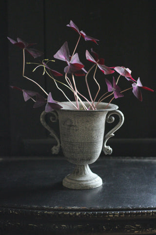 Footed urn